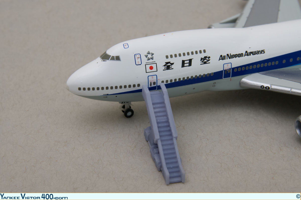 Wide-body aircraft air-stairs fitted to an All Nippon Airways 747 aircraft model.