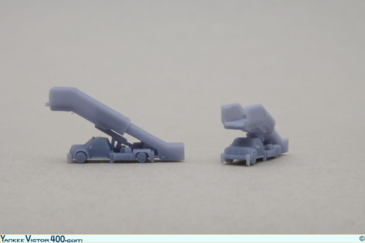 Unpainted 3D printed 1:400 airstair trucks from West Coast Diecast  for wide-body and narrow-body aircraft models. Unpainted 3D printed 1:400 airstair trucks from West Coast Diecast  for wide-body and narrow-body aircraft models.