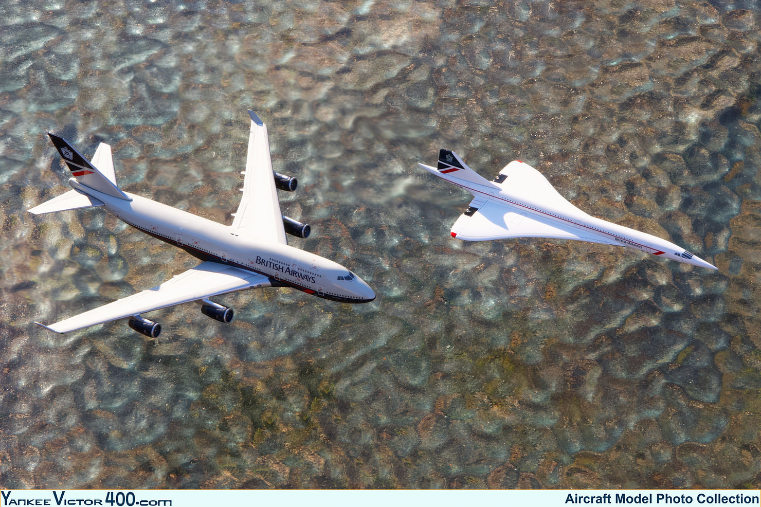 A photo portraying two 1:400 scale models of British Airways aircraft, a 747 and a Concorde. The aircraft appear to be in flight. A photo portraying two 1:400 scale models of British Airways aircraft, a 747 and a Concorde. The aircraft appear to be in flight.