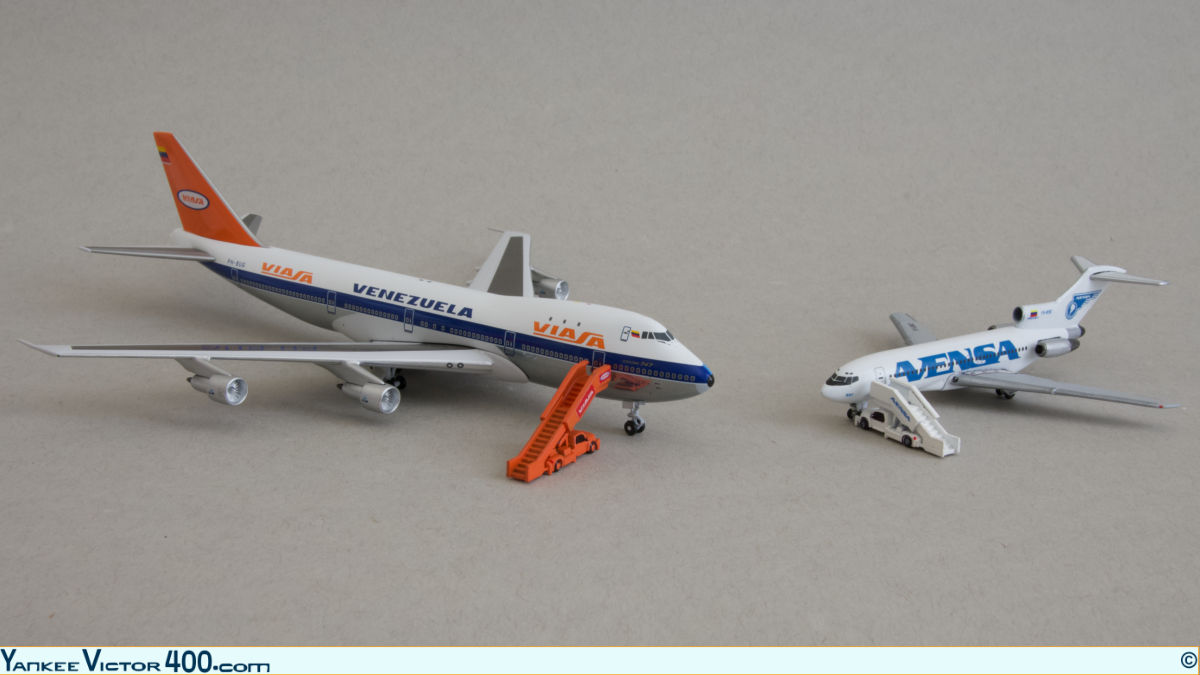 3D printed 1:400 airstair trucks by West Coast Diecastsporting the logos of Viasa and Avensa.
