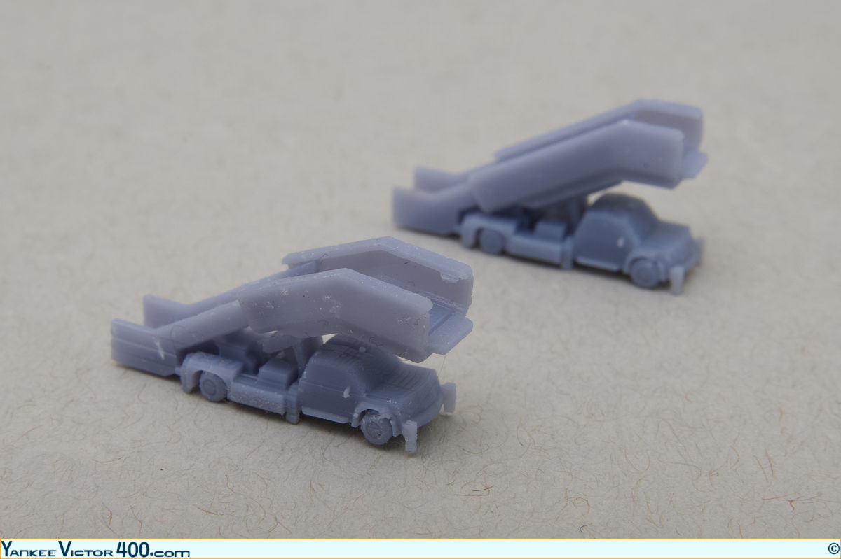 Unpainted 3D printed 1:400 airstair trucks from West Coast Diecast  for wide-body and narrow-body aircraft models. Unpainted 3D printed 1:400 airstair trucks from West Coast Diecast  for wide-body and narrow-body aircraft models.