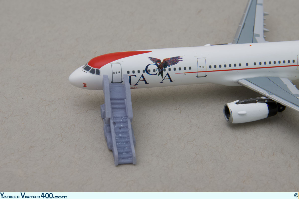 A narrow-body air-stair truck fitted to a TACA Airbus A321 aircraft model. A narrow-body air-stair truck fitted to a TACA Airbus A321 aircraft model.
