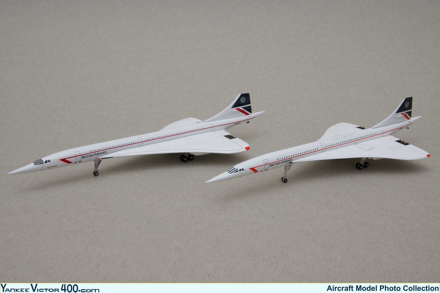 Two 1:400 scale models of British Airways Concorde Aircraft in the Landor livery Two 1:400 scale models of British Airways Concorde Aircraft in the Landor livery