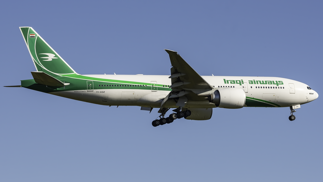 1280px-YI-AQZ_JFK_Landing_22L_IA_B777_29M_LR_Small.png